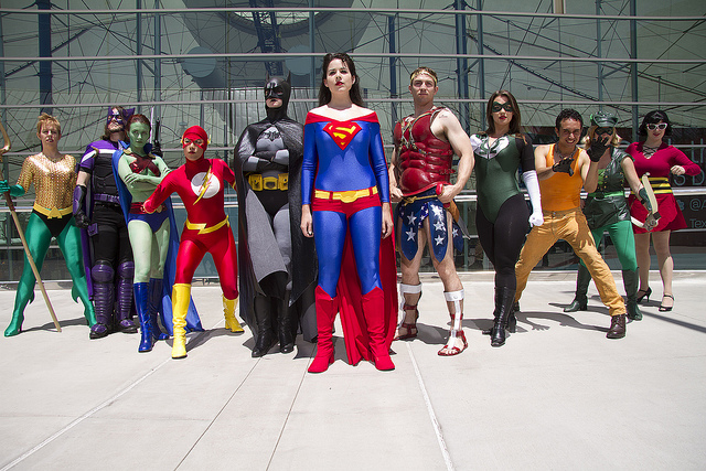 group of superhero cosplayers dressed as a gender-swapped Justice League